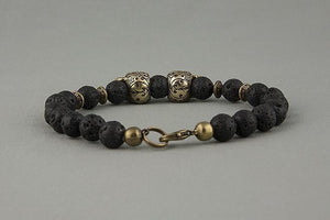Bracelet en Perles de Lave et Têtes de Mort en Bronze